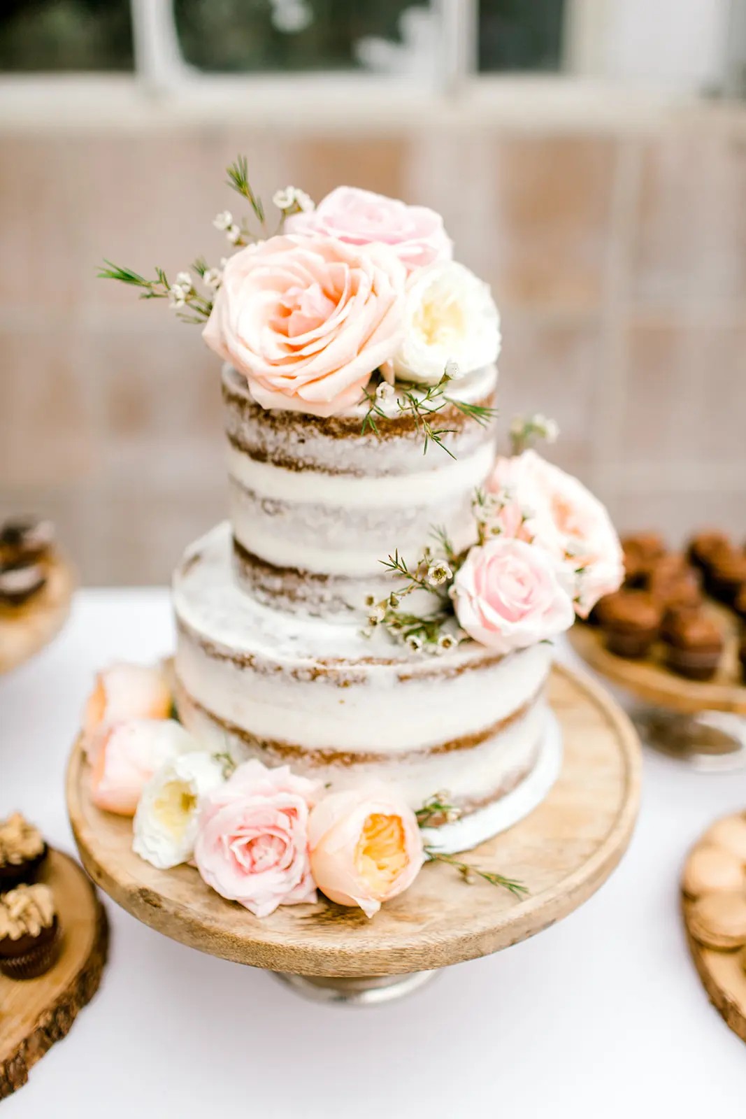 Naked Wedding Cake with Mini Botanicals & Flowers