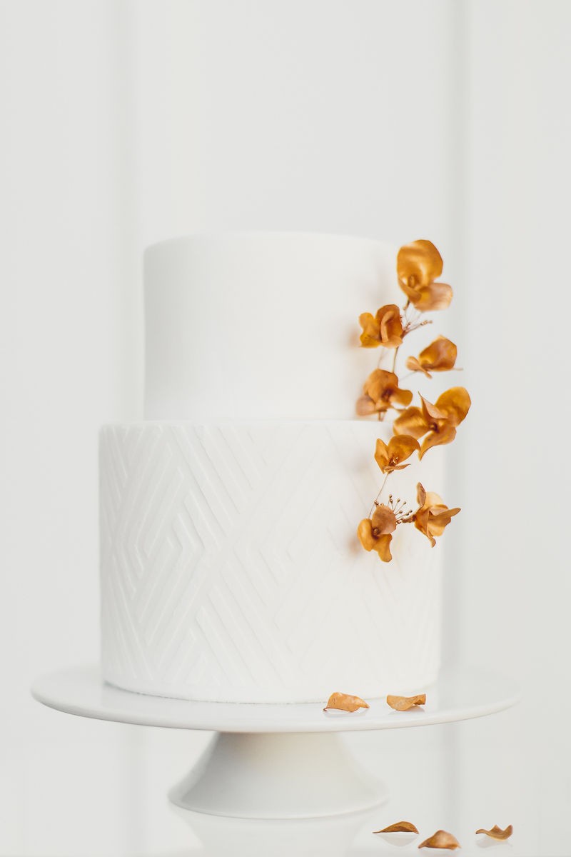 Minimalistic White Wedding Cake with Gold Florals