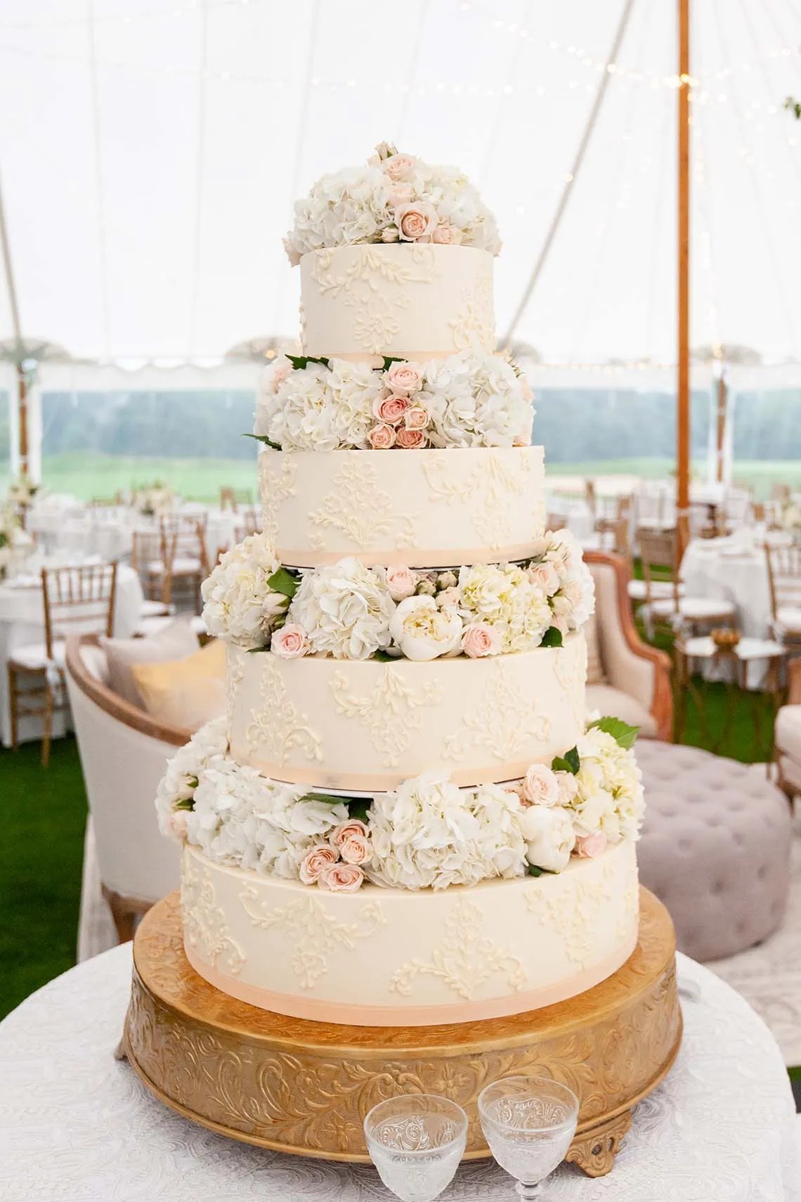 White & Pink Lace Wedding Cake with Layers of Florals